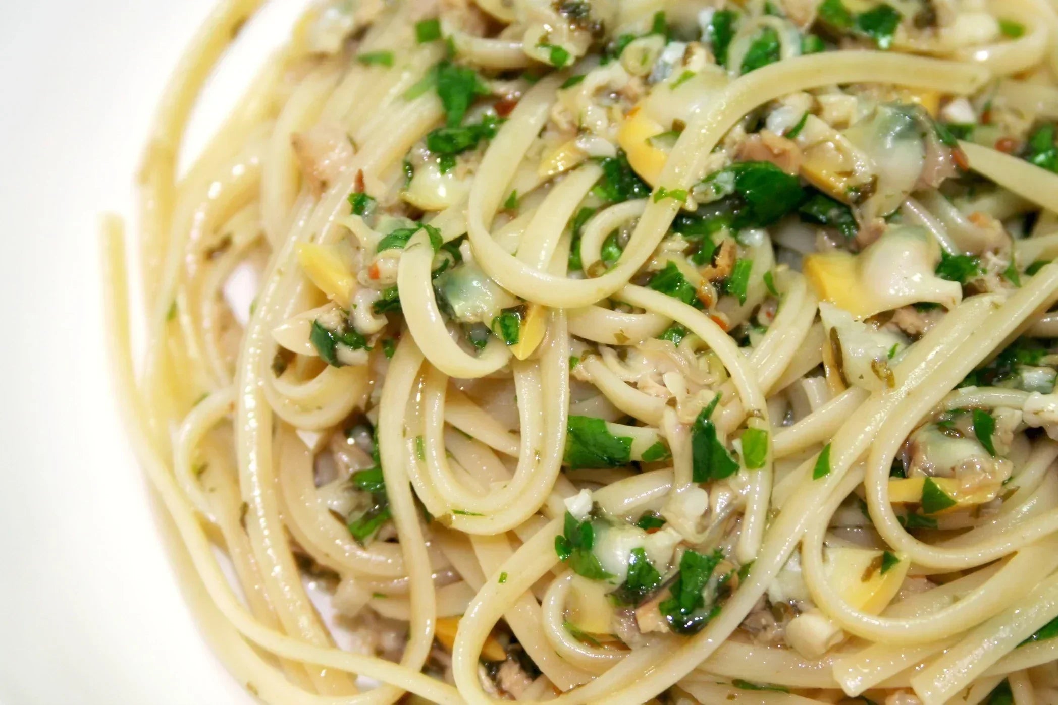 Stringozzi Limone with Clams, Zucchini & Peas