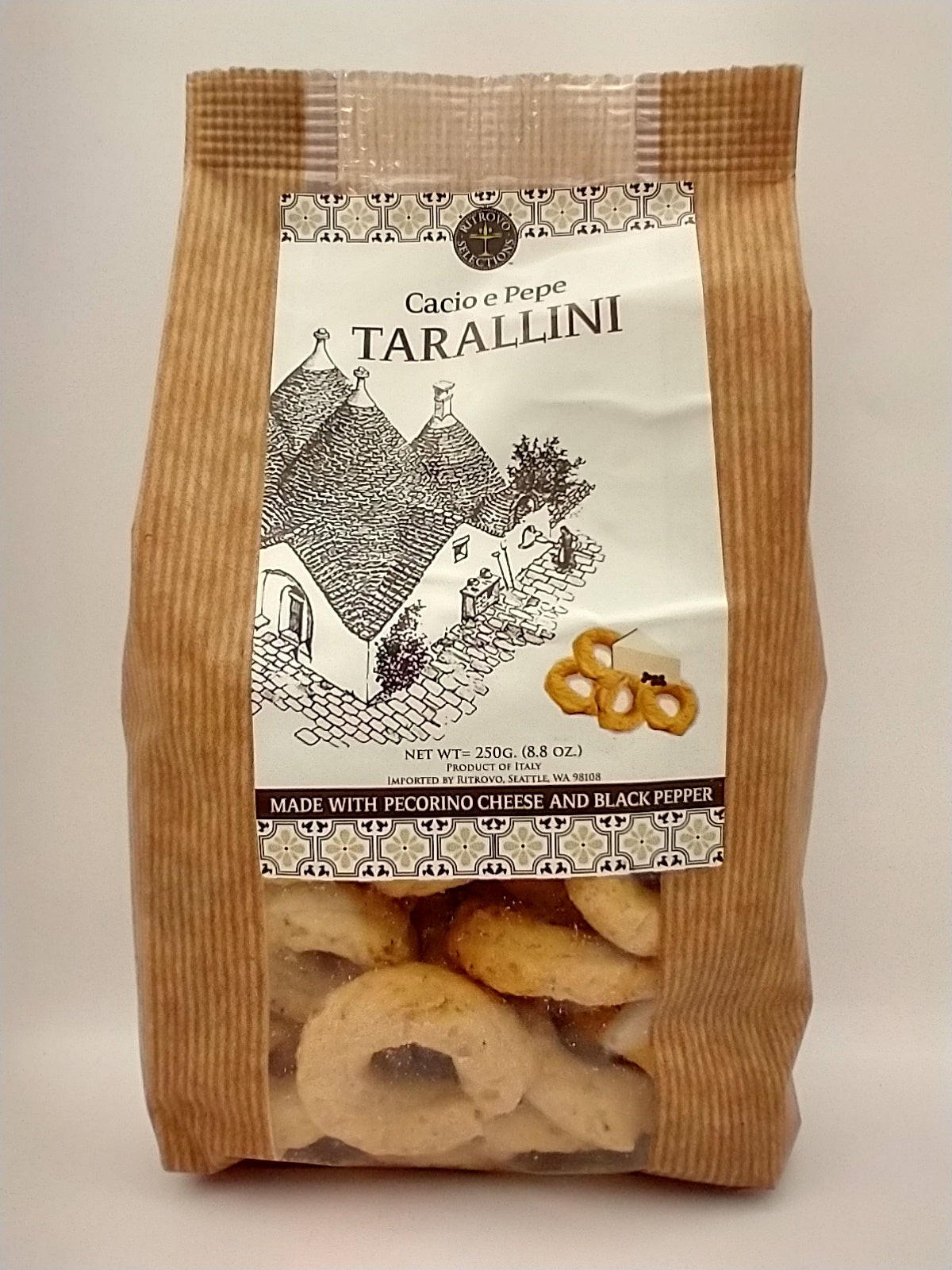 Packaging of Cacio e Pepe Taralli crackers visible through a transparent window, with branding and product information displayed.